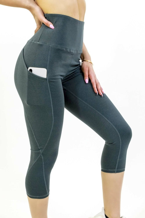 Leggings capri de cintura alta con bolsillos en la cadera de Seajoy Athletic