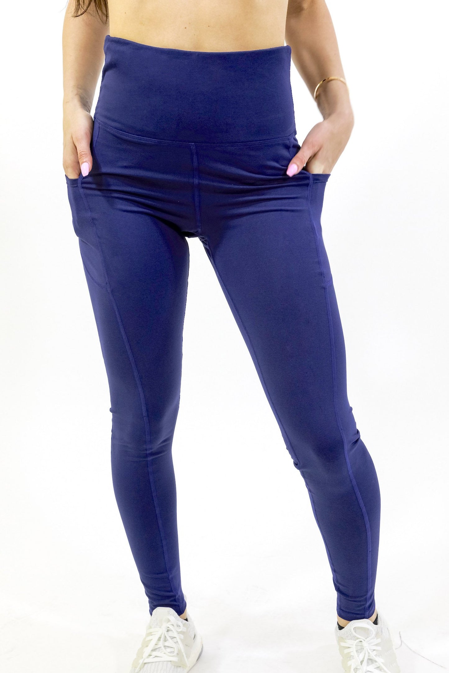 Leggings capri de cintura alta con bolsillos en la cadera de Seajoy Athletic